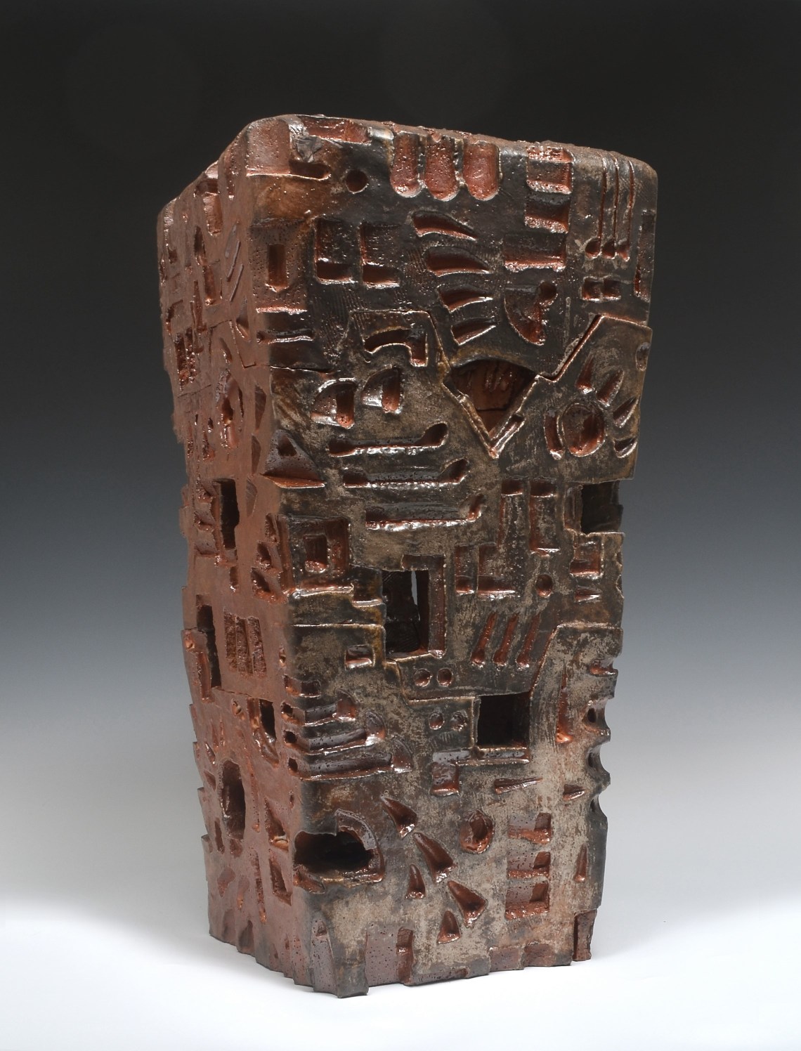 Sculpture with brown red oxide glazing